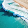 sea waves pounding on a sandy aerial