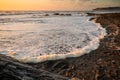 Sea waves reaching the shore of the beach