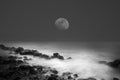 Sea waves rock and the moon