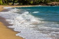 Sea waves run on the sandy beach, waves foam , small storm, Halkidiki, Greece