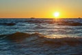 Sea, waves, sand, sunset, evening, travel, vacation, beach, relaxation Royalty Free Stock Photo