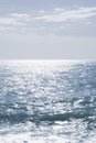 Blue sea and sky. Waves on the sea. Glare of the sun on the water. Royalty Free Stock Photo