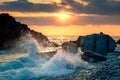 Sea waves splash up to the sky with sun. Sunset at Sea. Storm. Seascape Royalty Free Stock Photo