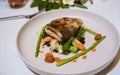 Seabass on a plate during Romantic dinner on beach of Huahin Thailand,