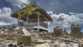 The seabed was exposed at low tide. Above the granite boulders there is a gazebo