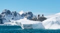 Seabourn Expedition Cruise ship behind iceberg in Antarctica. Royalty Free Stock Photo