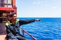 Young seafarer on the cargo ship.