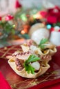 Seafood appetizer inside bread basket on Christmas table Royalty Free Stock Photo