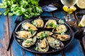 Seafood. Baked mussels with cheese and lemon in shells Royalty Free Stock Photo