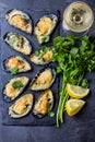 Seafood. Baked mussels with cheese and lemon in shells Royalty Free Stock Photo