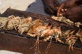 seafood baked on a simple grill on zanzibar beach
