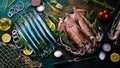 Seafood banner. Raw Saury fish and squid. Royalty Free Stock Photo