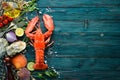 Seafood on a blue background. Lobster. Royalty Free Stock Photo