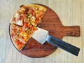 Seafood deluxe pizza on the wooden board. Royalty Free Stock Photo