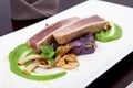 Seafood dinner with fillet of tuna, oyster mushrooms and pea puree