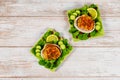 Seafood dish with stuffed clams on wooden background