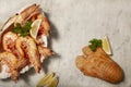 A seafood feast with king prawns, Moreton Bay bug crustacean and lemon