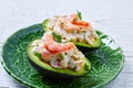 Seafood filled avocado with shrimps tapas pinchos