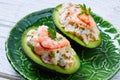 Seafood filled avocado with shrimps tapas pinchos