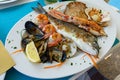 Seafood fish platter in Valun Cres island Croatia with tuna fish shrimps and mussels Royalty Free Stock Photo