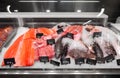 Seafood in fish shop fridge display case Royalty Free Stock Photo