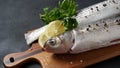 Seafood fresh mullet fish with lime, herbs and spices Royalty Free Stock Photo