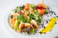 Seafood fresh salad with shrimps, mussels, salmon, green and cucumber Royalty Free Stock Photo