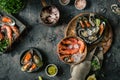 Seafood. Fresh shrimps, oysters, mussels, langoustines, octopus in ice with lemon Royalty Free Stock Photo