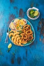 SEAFOOD hot platter baked scallops, fried squid rings and shimps Royalty Free Stock Photo