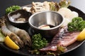 Seafood hot pot with fresh raw shrimp, squid, scallop, lemon, cu Royalty Free Stock Photo