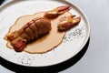 Seafood lobster with soup sauce. Cooked lobster on restaurant table, close-up Royalty Free Stock Photo