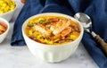 Seafood lunch a la chowder. Hot spicy corn cream soup with bacon and shrimps. Royalty Free Stock Photo