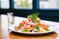 seafood nachos with crabmeat and fresh dill