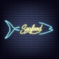 Seafood. Seafood neon sign. Neon glowing signboard banner design Royalty Free Stock Photo