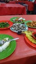 A plate of fish, a plate of prawn, a plate of scallop in the top of table, nice time seafood dinner