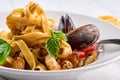 Seafood pasta fettuccine with mussels and basil. Spaghetti vongole - traditonal italian cuisine dish