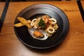 Seafood pasta, shell, shrimp, squid in circle bowl on wooden table, top view Royalty Free Stock Photo