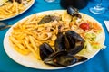 Seafood platter with fries Royalty Free Stock Photo