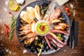 Seafood platter for 2-4 persons. Lobster, octopus, blue mussels, Argentina king prawns, tuna tartare. Delicious healthy Royalty Free Stock Photo