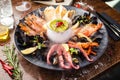 Seafood platter for 2-4 persons. Lobster, octopus, blue mussels, Argentina king prawns, tuna tartare. Delicious healthy Royalty Free Stock Photo