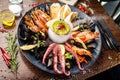 Seafood platter for 2-4 persons. Lobster, octopus, blue mussels, Argentina king prawns, tuna tartare. Delicious healthy Royalty Free Stock Photo