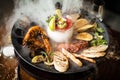 Seafood platter for 2-4 persons. Octopus, blue mussels, cooked green mussels, grilled tiger prawns, tuna tartare