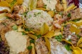 Seafood platter Plato pescado mixto. Different kinds of fish, sauce, beans, rice, lettuce leaves. Top view. Close-up