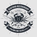 Seafood restaurant logo with Crab and fishing rods. Vintage badge design. Vector illustration