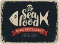 Seafood restaurants with fish and jolly roger Royalty Free Stock Photo