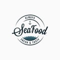 Seafood round logo. Sea food lettering on white