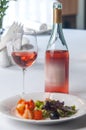 Seafood salad and a glass of rose wine. Royalty Free Stock Photo