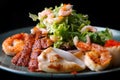 Seafood salad. Shrimps, eel, squids, lettuce. Against a dark background Royalty Free Stock Photo