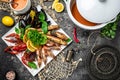 Seafood set. A plate full of cooked shrimp, fish, crayfish, mussels. banner, menu, recipe place for text, top view Royalty Free Stock Photo