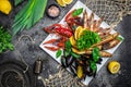 seafood set. A plate full of cooked shrimp, fish, crayfish, mussels. banner, menu, recipe place for text, top view Royalty Free Stock Photo